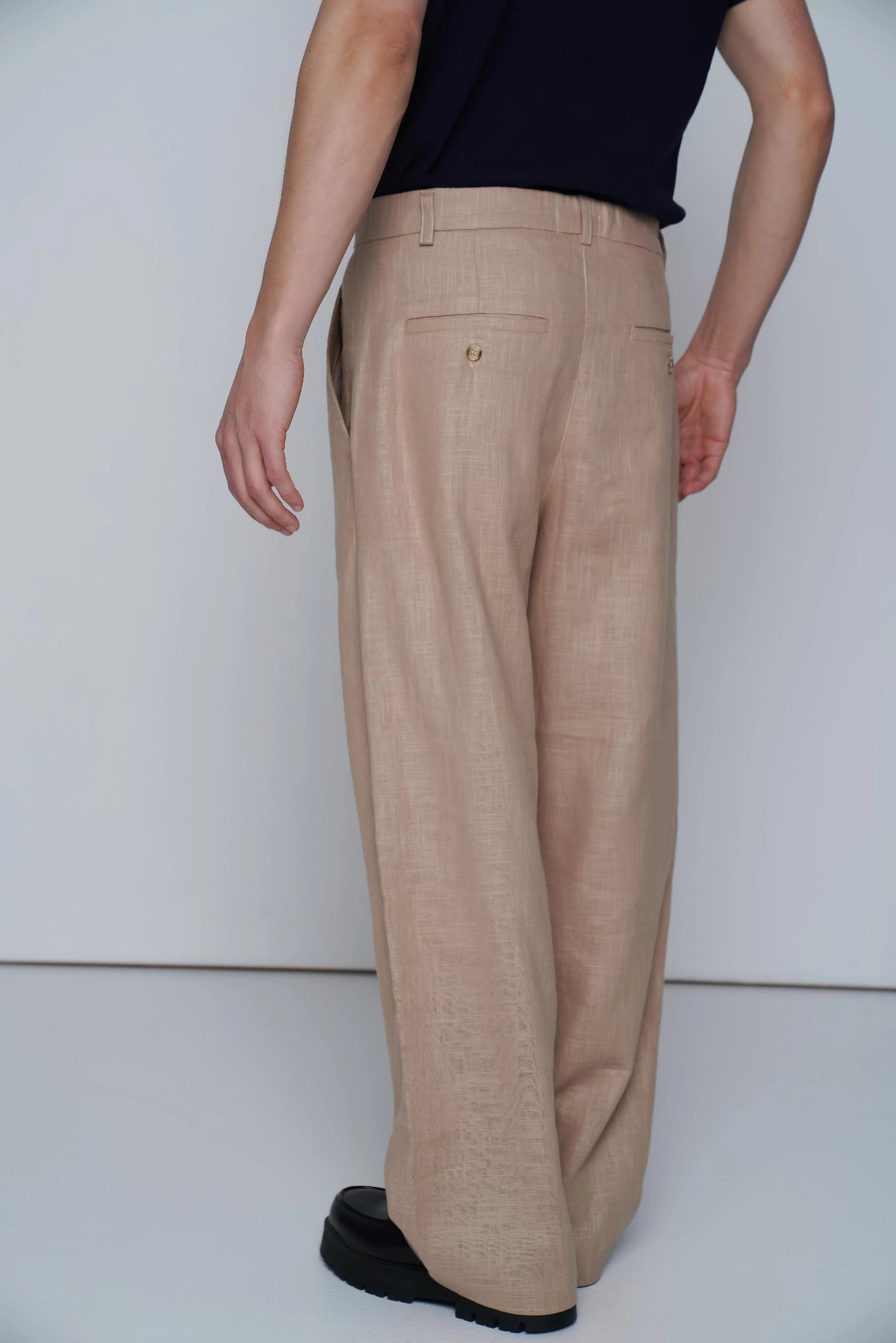 BEIGE EDGE TROUSERS back view