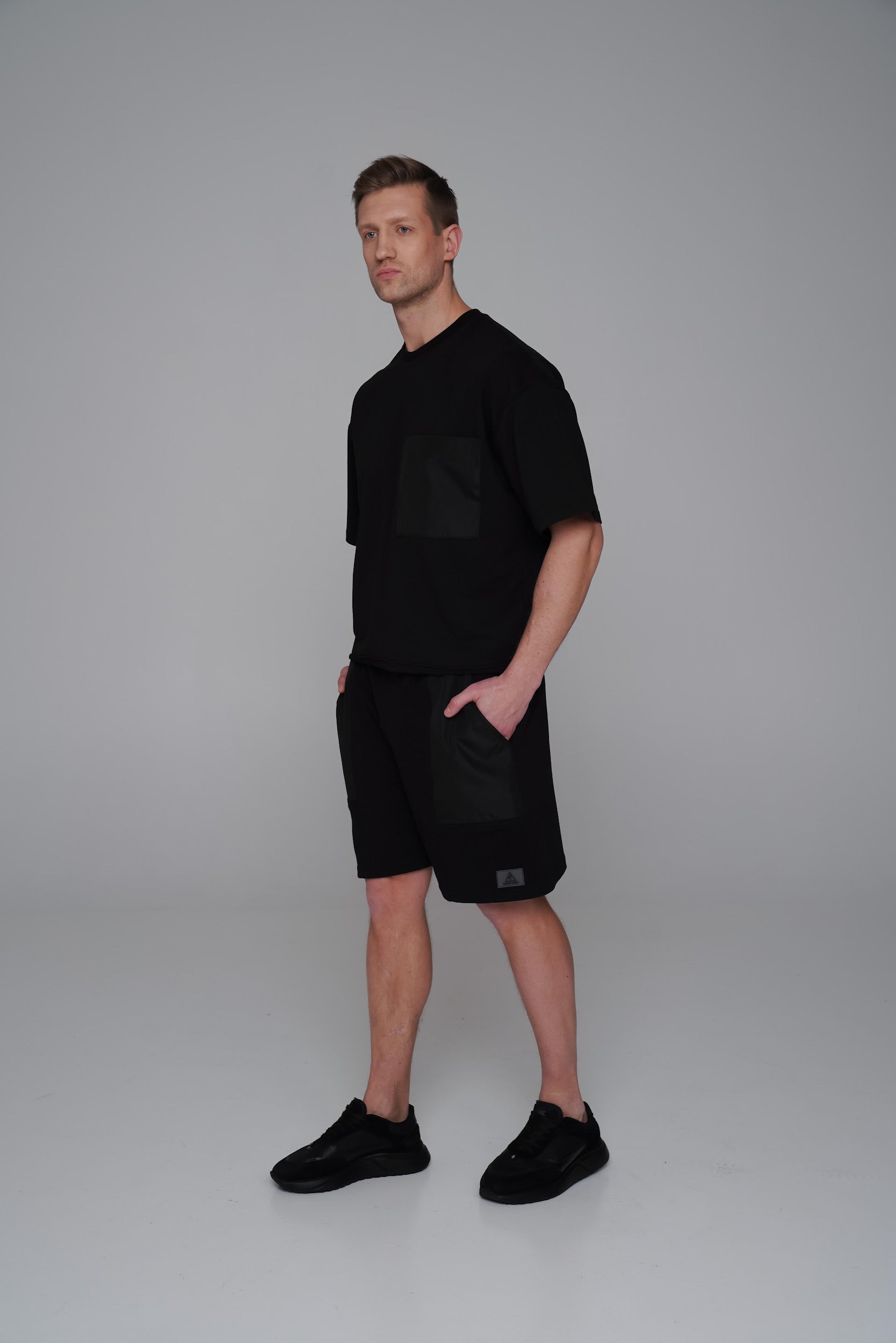 Saint Issa Men’s Black Oversized Shorts — Contrast Patch Panels