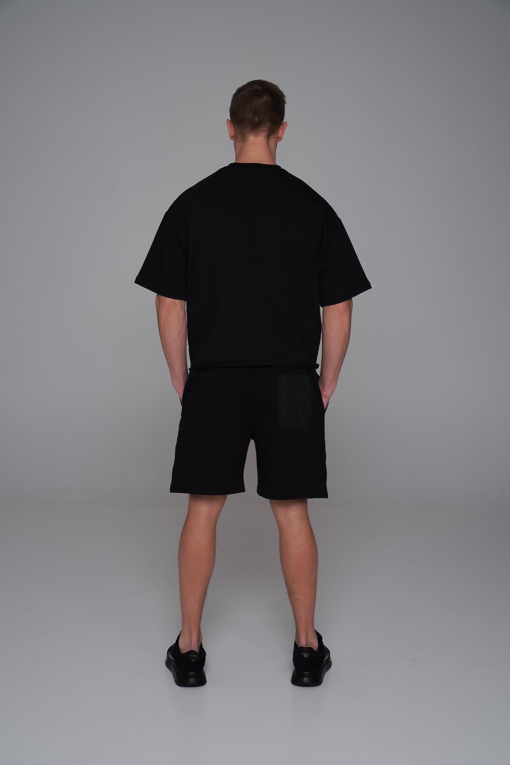 Saint Issa Men’s Black Oversized Shorts — Contrast Patch Panels