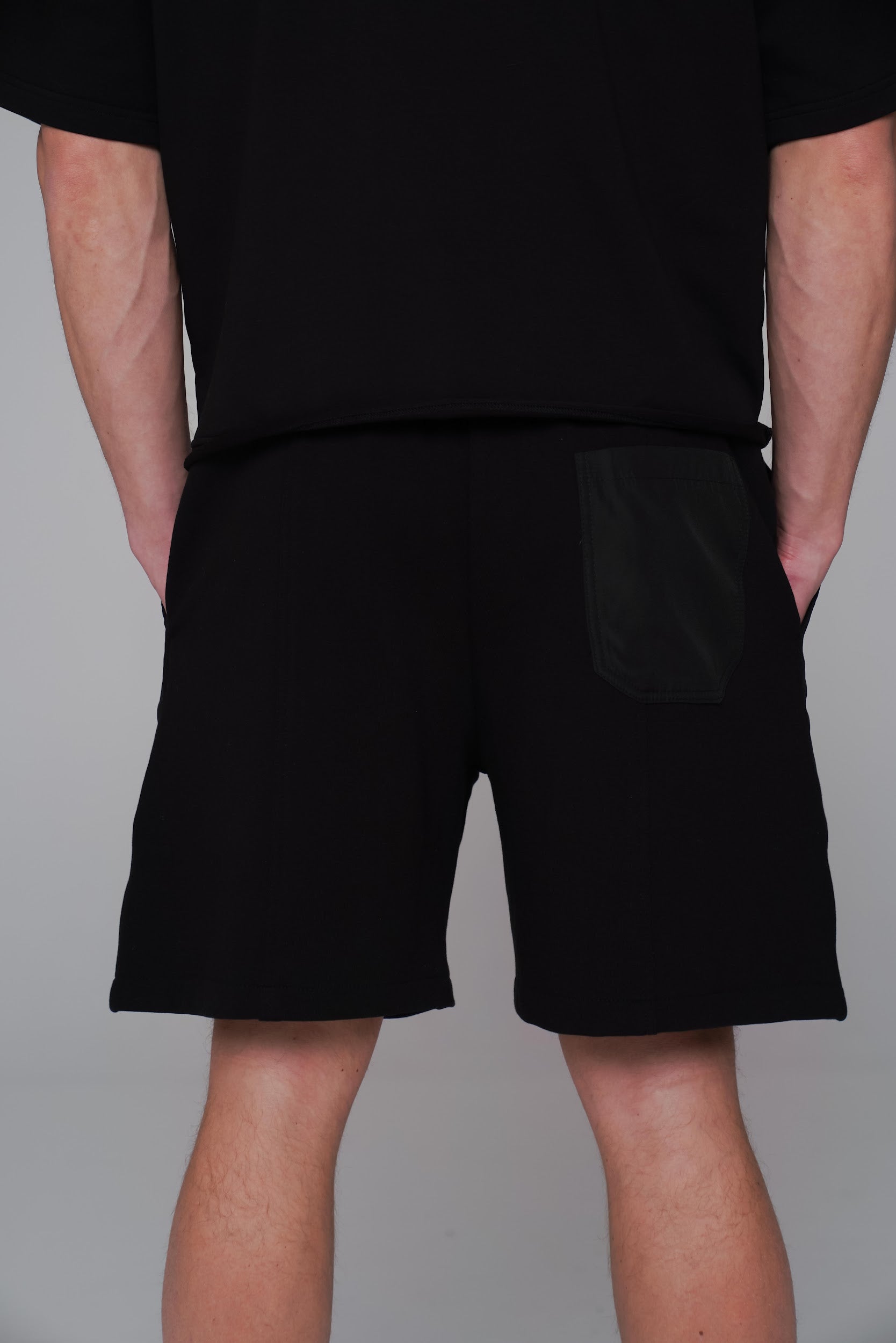 Saint Issa Men’s Black Oversized Shorts — Contrast Patch Panels