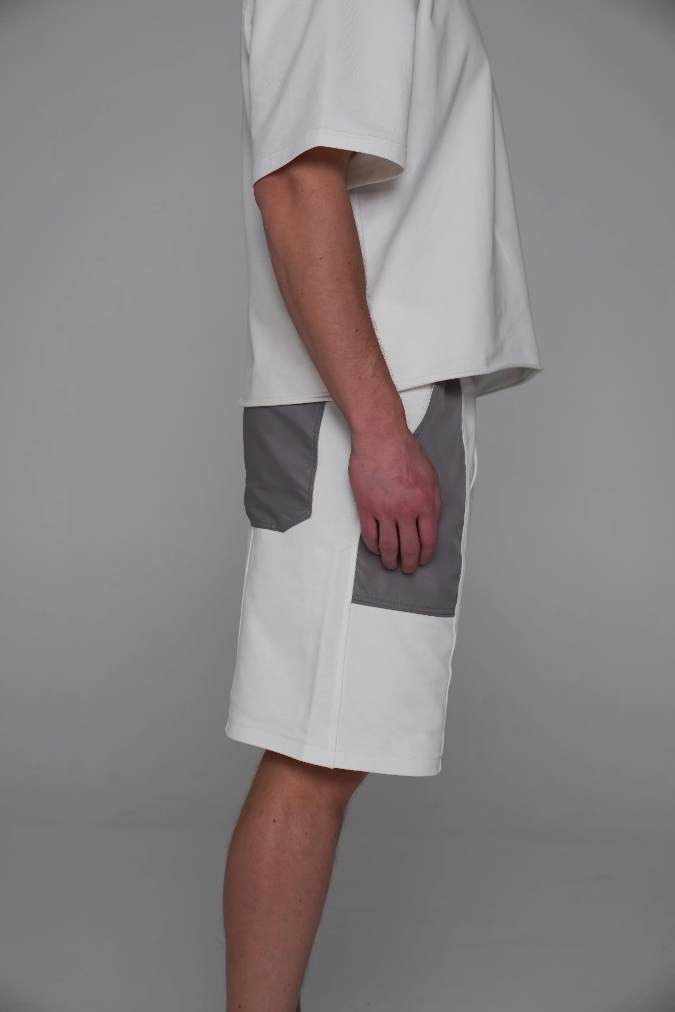 SAINT ISSA MEN’S CHAMPAGNE OVERSIZED SHORTS — CONTRAST PATCH PANELS