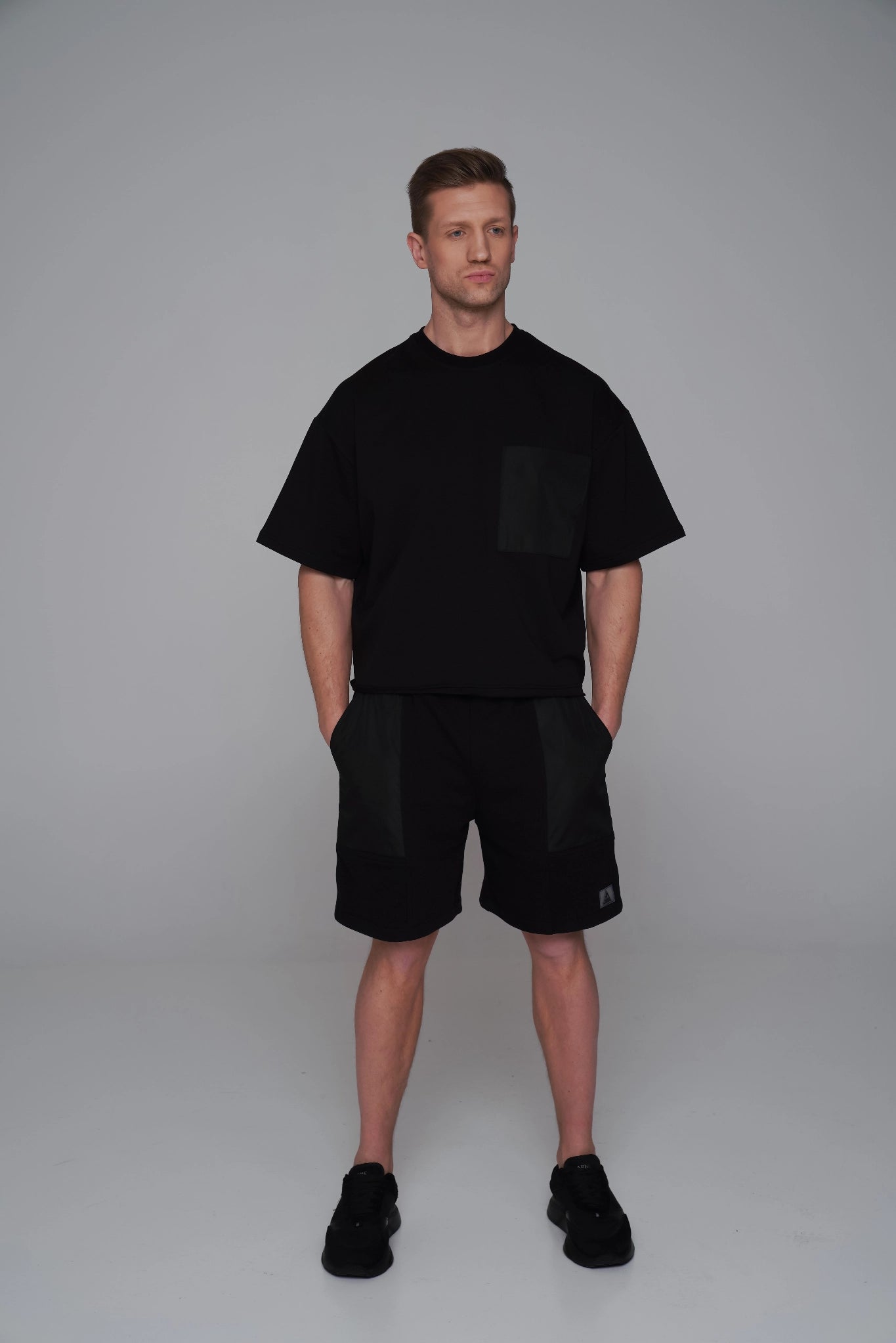 Saint Issa Men’s Black Oversized Shorts — Contrast Patch Panels