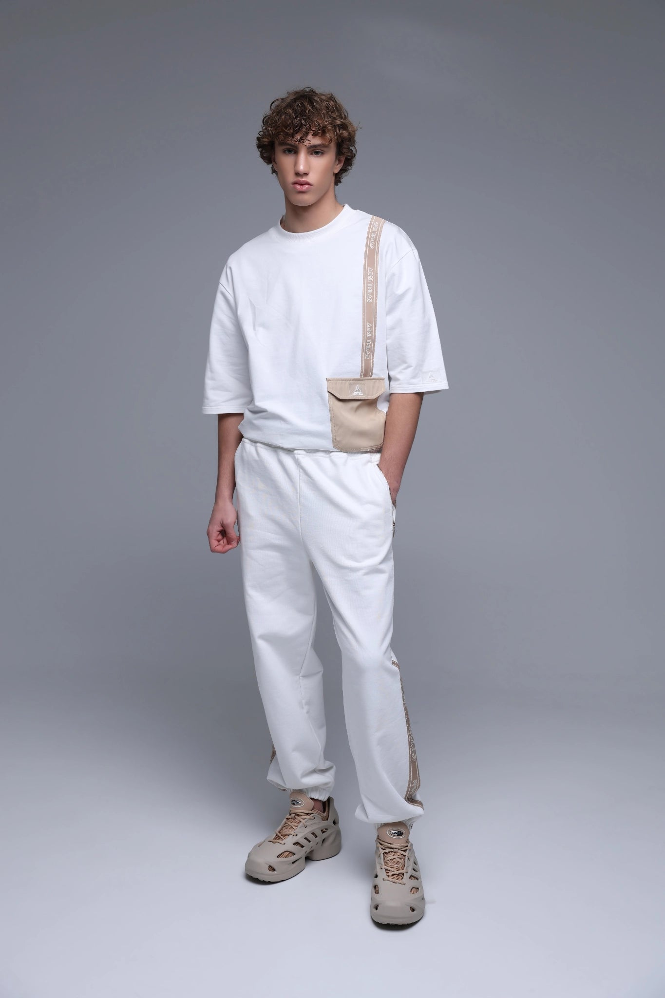 MEN'S IVORY ELEGANCE JOGGERS Saint Issa branding